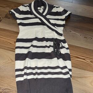 White and grey striped sweater dress with cinched waist and decorative tie